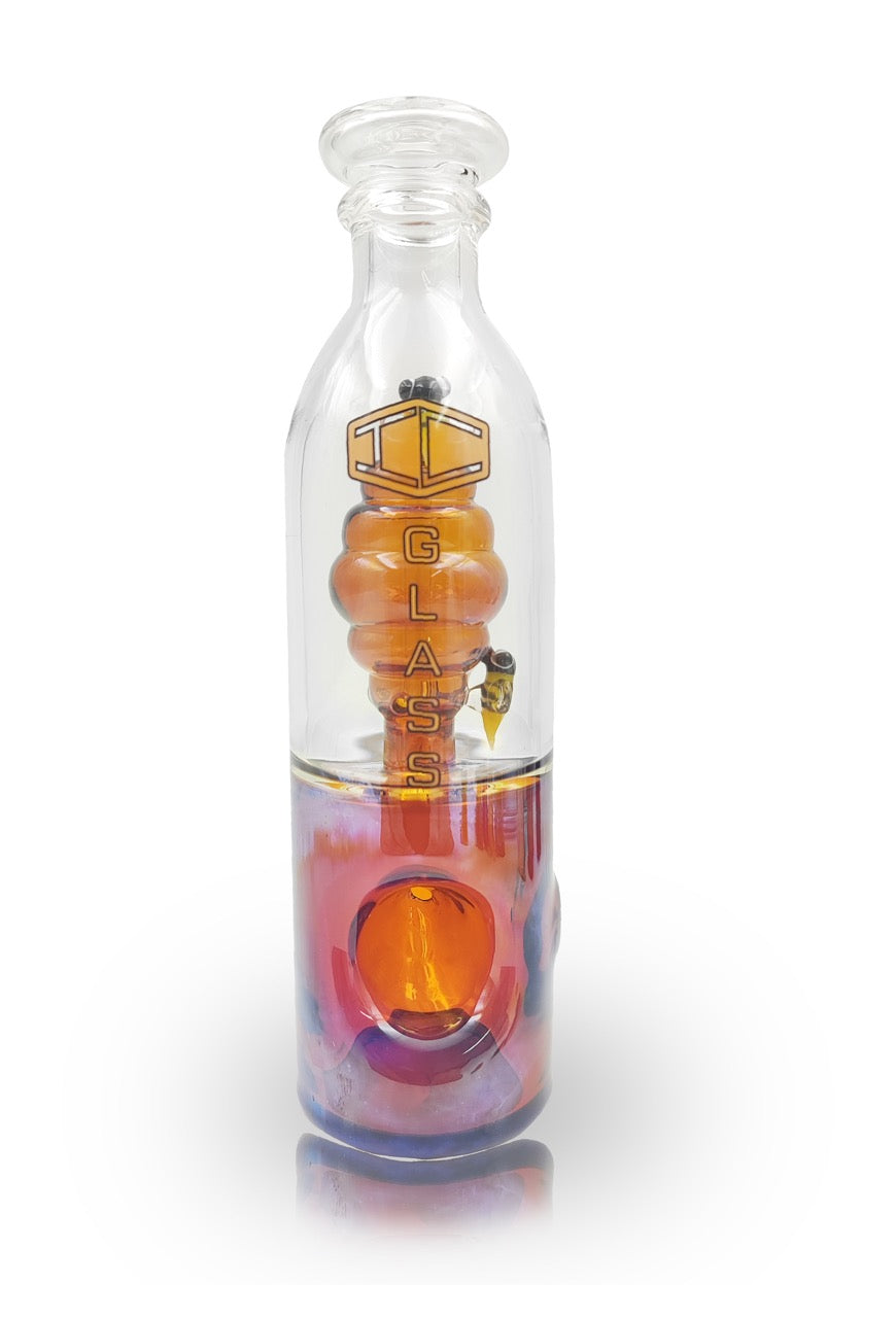 Close-up of IC GLASS Honey Bee handpipe showing detailed honey bee glass artwork