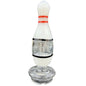 A novelty glass bottle shaped like a bowling pin, featuring a white upper section with red stripes, a clear middle section, and a clear glass base, set against a solid black background.