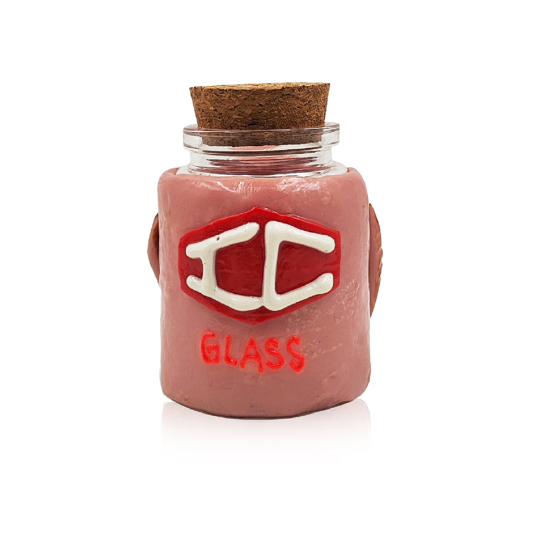Keep your stash fresh with the IC GLASS jar! Featuring a 3D-crafted one-eyed monster & IC logo, this glass jar with a cork cap is a must-have.