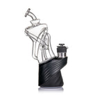 MJ Arsenal Tempest glass attachment for Puffco Peak and Peak Pro featuring a twisted recycler chamber, black textured base, and premium borosilicate glass design for smooth concentrate sessions.