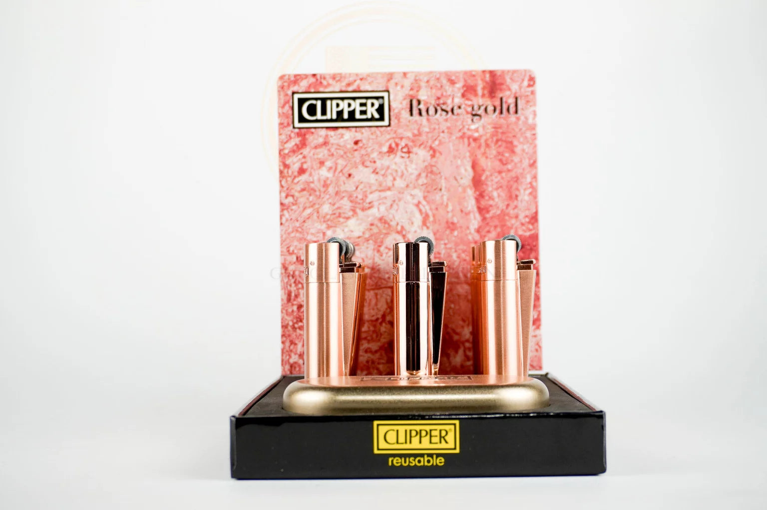 Refillable CLIPPER METAL lighter with signature round flint ignition system