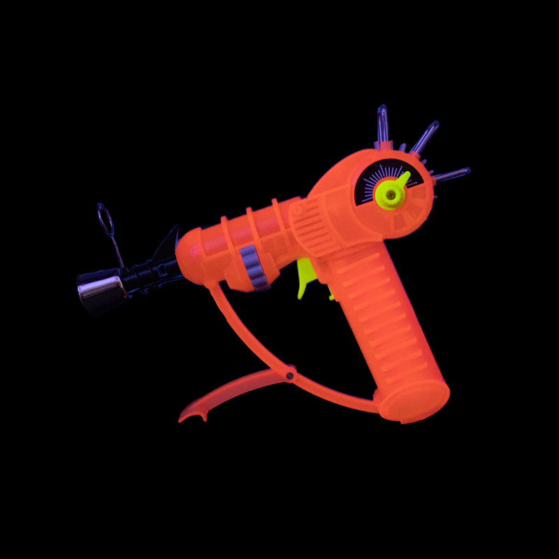 Get the THICKET SPACEOUT Raygun Glow in the Dark Torch in assorted colors – a top pick for wholesale cannabis accessories and bulk smoking supplies. Perfect for California smoke shops.