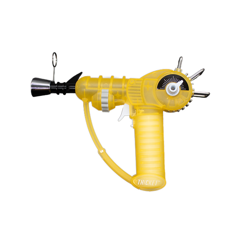 Get the THICKET SPACEOUT Raygun Glow in the Dark Torch in assorted colors – a top pick for wholesale cannabis accessories and bulk smoking supplies. Perfect for California smoke shops.