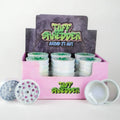 Shop the Tuff Shredder 45MM Iridescent 4-Piece Grinder with Ashtray – top-rated wholesale cannabis accessory with a weed print design and built-in ashtray.