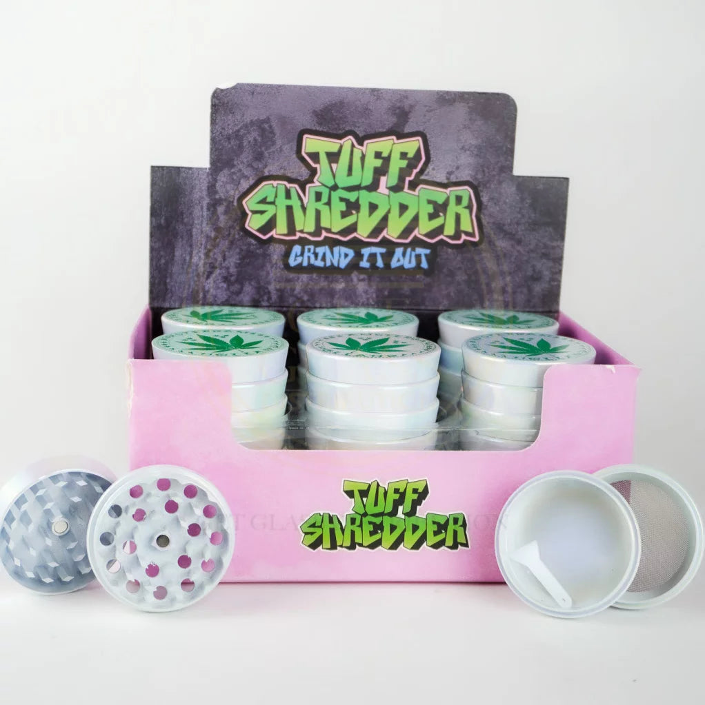 Shop the Tuff Shredder 45MM Iridescent 4-Piece Grinder with Ashtray – top-rated wholesale cannabis accessory with a weed print design and built-in ashtray.