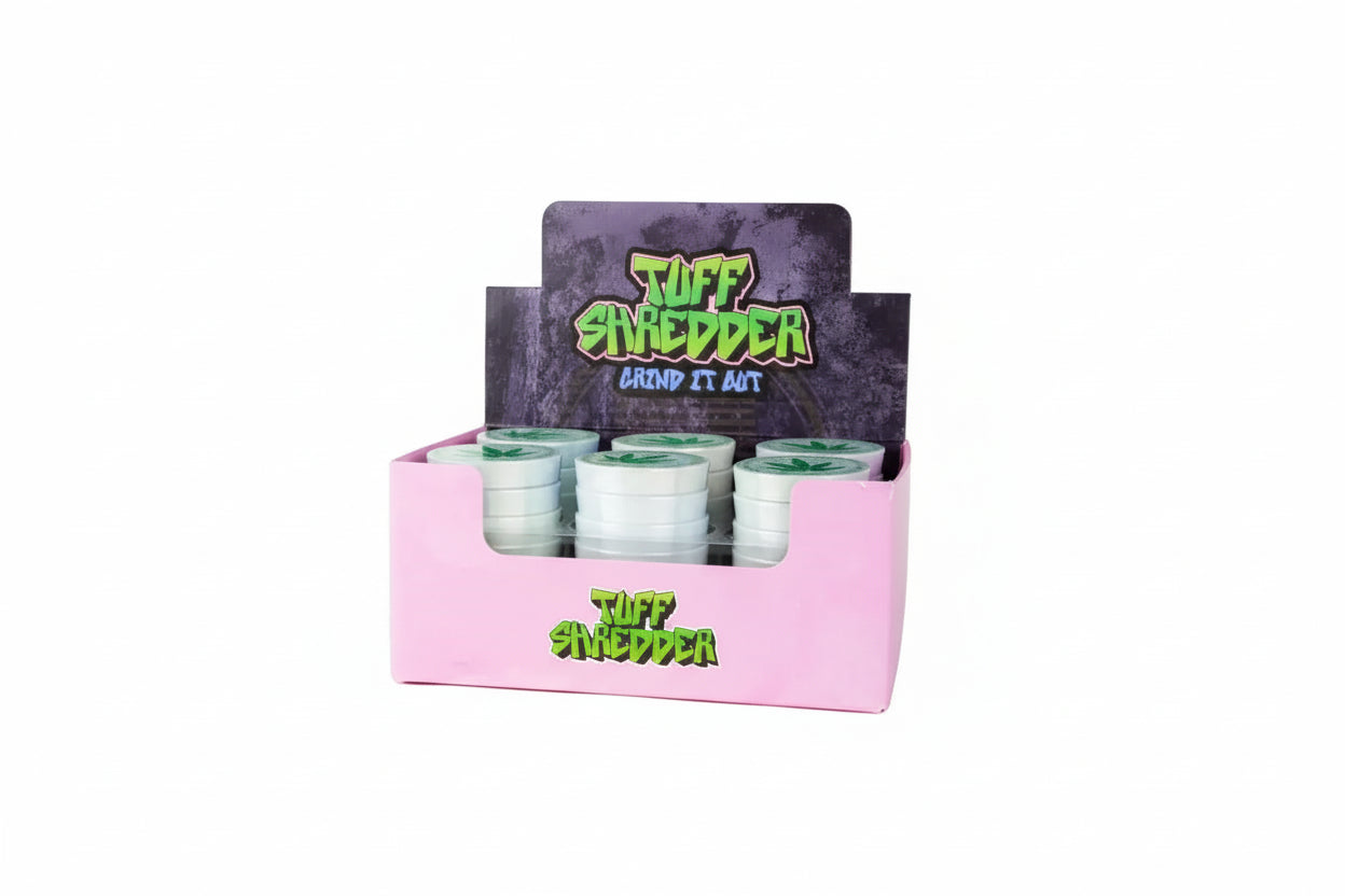 Shop the Tuff Shredder 45MM Iridescent 4-Piece Grinder with Ashtray – top-rated wholesale cannabis accessory with a weed print design and built-in ashtray.