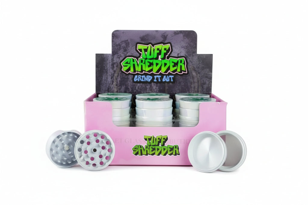 Shop the Tuff Shredder 45MM Iridescent 4-Piece Grinder with Ashtray – top-rated wholesale cannabis accessory with a weed print design and built-in ashtray.